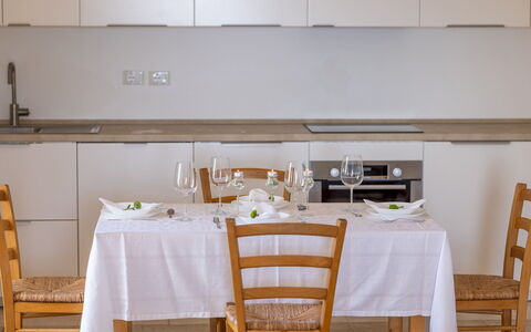 Villa Floria 4: Furniture, Interior Design, Flooring, Countertop, Kitchen, Wood, Cabinetry, Floor, Kitchen Appliance, Lighting