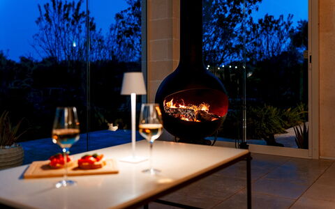 Villa Belkis 6: Lighting, Heat, Hearth, Chair, Chimney, Fireplace, Houseplant, Living Room
