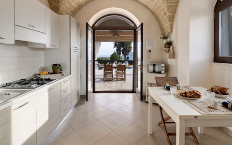 Villa Serena 4: Furniture, Interior Design, Flooring, Kitchen, Kitchen & Dining Room Table, Floor, Table, Countertop, Kitchen Appliance, Home