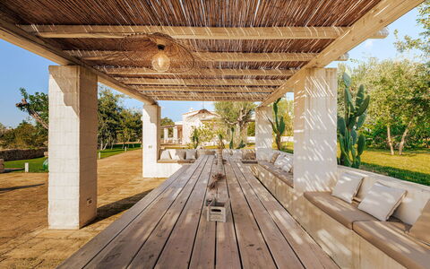 Opuntia Trulli e Lamie 10: Wood, Column, Porch, Shade, Outdoor Structure, Garden, Estate, Landscaping, Resort, Natural Material
