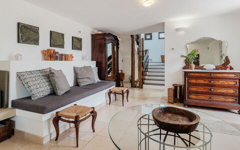 Villa Giari 8: Furniture, Interior Design, Flooring, Wall, Floor, Wood, Room, Couch, Living Room, Lighting