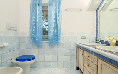 Villa Typha 10: Blue, Flooring, Interior Design, Floor, Plumbing Fixture, Bathroom, Tile, Room, Tap, Bathroom Sink
