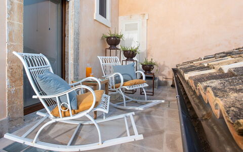 Belvedere Guastella a 8: Furniture, Chair, Outdoor Furniture, Flooring, Interior Design, Floor, Houseplant, Living Room, Flowerpot, Armrest