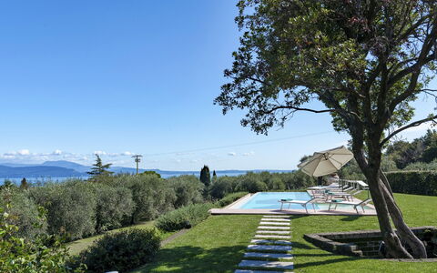 Villa del Prato 8: Blue, Landscape, Land Lot, Garden, Groundcover, Mountain Range, Landscaping, Lawn, Ridge, Hedge