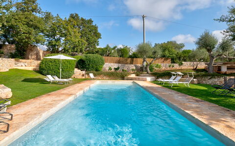 Trullo Luna 6+1: Blue, Swimming Pool, Resort, Water Feature, Garden, Landscaping, Outdoor Furniture, Hacienda, Flagstone, Backyard