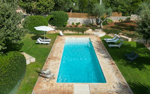 Trullo Luna 6+1: Swimming Pool, Blue, Resort, Composite Material, Garden, Backyard, Shade, Outdoor Furniture, Landscaping, Water Feature