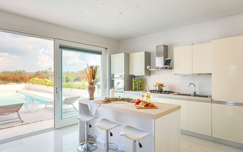 Dimora Solaris 6: Furniture, Kitchen, Interior Design, Countertop, Flooring, Kitchen Appliance, Cabinetry, Ceiling, Floor, Home