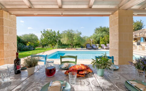 Trulli Italia 6+2: Furniture, Outdoor Furniture, Chair, Garden, Shade, Estate, Swimming Pool, Landscaping, Resort, Patio