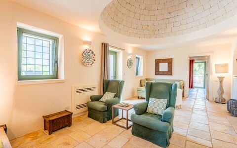 Trullo Magnifico 8: Wall, Interior Design, Flooring, Ceiling, Furniture, Floor, Lighting, Room, Light Fixture, Living Room