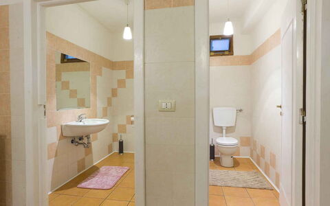 Villa Arbeio 8+6: Flooring, Wall, Floor, Plumbing Fixture, Bathroom, Interior Design, Ceiling, Toilet, Plumbing, Room
