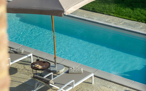 Cascina Buzio 12: Outdoor Furniture, Umbrella, Swimming Pool, Furniture, Sunlounger, Shade, Chair, Outdoor Table, Design, Resort