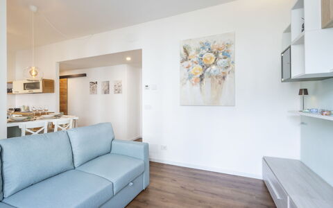 Genzianella Alpine Apartment: Flooring, Floor, Ceiling, Interior Design, Countertop, Kitchen, Cabinetry, Room, Major Appliance, Light Fixture