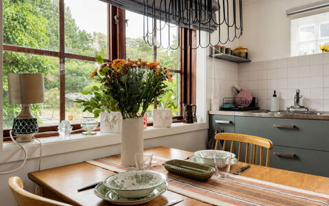 Solgläntan: Furniture, Interior Design, Wood, Kitchen, Flooring, Lighting, Light Fixture, Kitchen & Dining Room Table, Countertop, Tableware