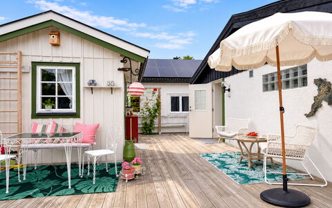 Solgläntan: Home, Cottage, Furniture, Door, Flowerpot, Chair, Deck, Porch, Houseplant, Yard