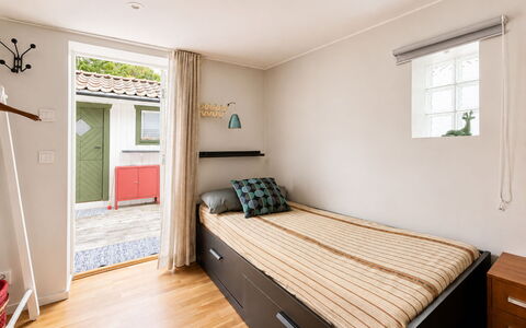 Solgläntan: Wall, Bed, Bedroom, Interior Design, Furniture, Floor, Flooring, Wood, Bed Sheet, Ceiling
