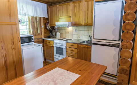 Niinimökki: Wood, Flooring, Interior Design, Furniture, Floor, Kitchen, Cabinetry, Countertop, Room, Wood Stain