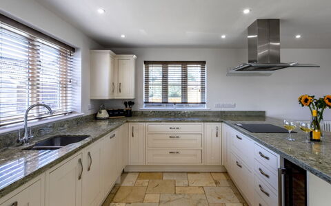 The Farmhouse at Rusty Lane Farm: Kitchen, Countertop, Cabinetry, Interior Design, Flooring, Wood, Furniture, Home, Floor, Ceiling