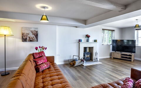 The Farmhouse at Rusty Lane Farm: Furniture, Interior Design, Flooring, Couch, Wall, Floor, Wood, Living Room, Room, Ceiling