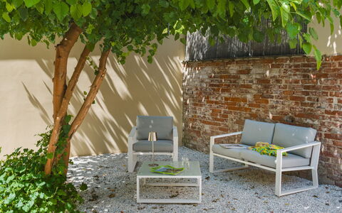 Contemporary House: Furniture, Outdoor Furniture, Chair, Garden, Groundcover, Shade, Bench, Armrest, Backyard