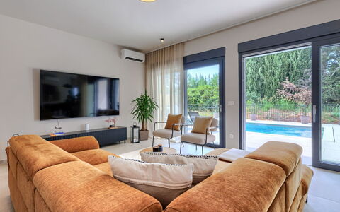 Riata: Furniture, Interior Design, Flooring, Couch, Floor, Wood, Ceiling, Living Room, Home, Apartment