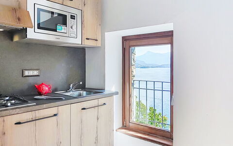 Casa Olivee: Room, Apartment, Balcony, Wood Stain, Kitchen Sink, Hardwood, Chair, Plumbing Fixture, Kitchen, Sink
