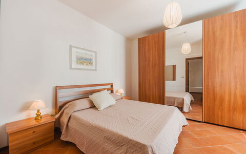 La Casa di Margot: Interior Design, Furniture, Flooring, Bed, Floor, Wood, Bedroom, Ceiling, Room, Wood Flooring
