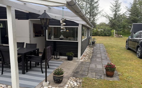 Eike - from the Sea: Roof, Home, Door, Shade, Awning, Cottage, Outdoor Structure, Yard, Porch, Chair