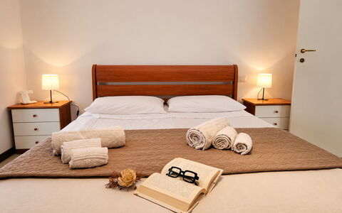 Villa Patrizia: Furniture, Bedroom, Bed, Interior Design, Bed Sheet, Floor, Bed Frame, Bedding, Room, Apartment