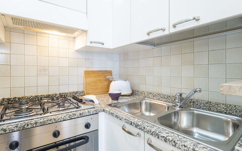 Nautilus: Kitchen, Major Appliance, Countertop, Flooring, Interior Design, Kitchen Appliance, Plumbing Fixture, Floor, Tap, Kitchen Sink