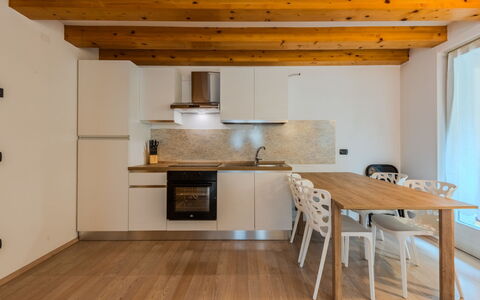 Rugia: Furniture, Interior Design, Flooring, Floor, Wood Flooring, Wood, Ceiling, Room, Countertop, Kitchen