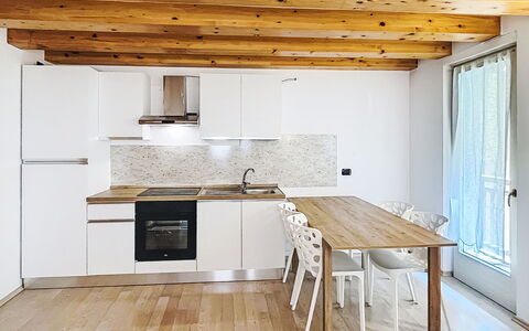 Rugia: Furniture, Interior Design, Flooring, Floor, Wood Flooring, Kitchen, Wood, Countertop, Ceiling, Room