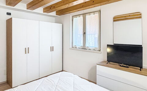 Rugia: Furniture, Interior Design, Flooring, Wood, Bedroom, Bed, Floor, Room, Ceiling, Lighting