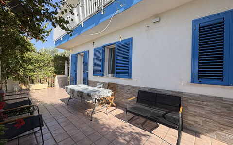 La Casa dei Melograni: Blue, Outdoor Furniture, Shade, Houseplant, Chair, Flowerpot, Outdoor Table, Balcony, Kitchen & Dining Room Table, Daylighting