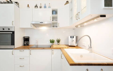 Meeresblick Ankerplatz 84: Kitchen, Countertop, Cabinetry, Kitchen Appliance, Wood, Plumbing Fixture, Furniture, Flooring, Major Appliance, Interior Design
