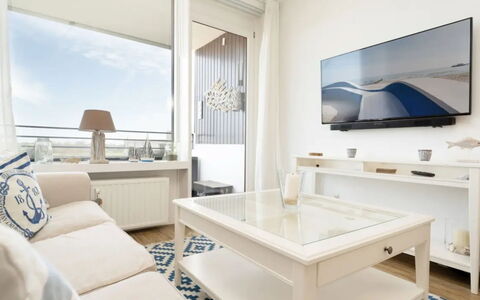 Meeresblick Ankerplatz 84: Furniture, Interior Design, Flooring, Floor, Couch, Living Room, Ceiling, Room, Apartment, Home