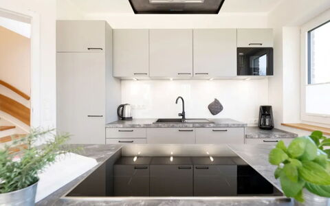 Reiterhof Rickert Glücksklee: Kitchen, Countertop, Kitchen Appliance, Interior Design, Cabinetry, Furniture, Flooring, Wood, Ceiling, Light Fixture
