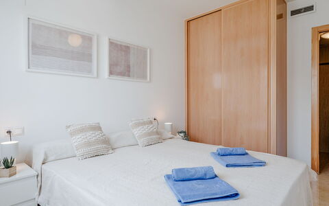 Oliva Nova Cabagua: Wall, Interior Design, Furniture, Bed, Wood, Bedroom, Floor, Flooring, Ceiling, Room