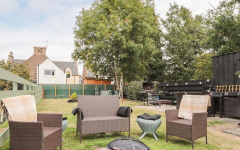 Ballinreich: Furniture, Outdoor Furniture, Chair, Table, Outdoor Table, Garden, Land Lot, Coffee Table, Groundcover, Backyard