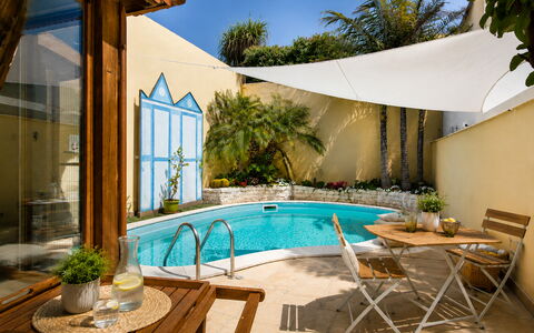 Villa Cristiana: Furniture, Swimming Pool, Outdoor Furniture, Resort, Chair, Eco Hotel, Shade, Flowerpot, Umbrella, Houseplant