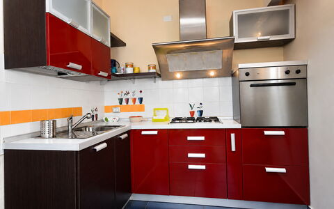 Villa Cristiana: Kitchen, Kitchen Appliance, Cabinetry, Furniture, Major Appliance, Kitchen Stove, Countertop, Wood, Interior Design, Stove