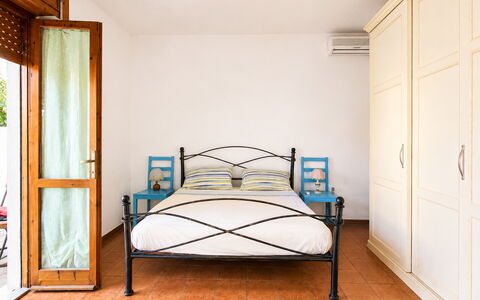 Casa Bianca, Budoni: Furniture, Bed, Bedroom, Interior Design, Flooring, Wood, Floor, Bedding, Bed Sheet, Room