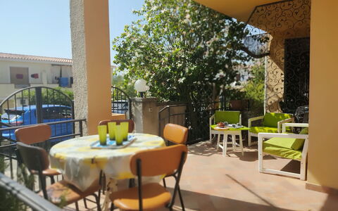 Casa Bianca, Budoni: Furniture, Chair, Outdoor Furniture, Balcony, Porch, Shade, Outdoor Table, Kitchen & Dining Room Table, Backyard, Yard