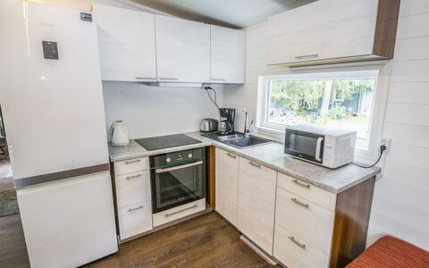 Tuuliranta: Major Appliance, Wood Flooring, Kitchen, Hardwood, Countertop, Wood Stain, Sink, Tap, Kitchen Appliance, Plumbing