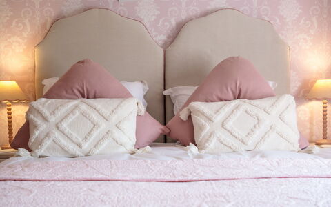 The Old Schoolhouse at Penrhos: Bed, Bedding, Bedroom, Furniture, Bed Sheet, Interior Design, Cushion, Linens, Pink, Throw Pillow