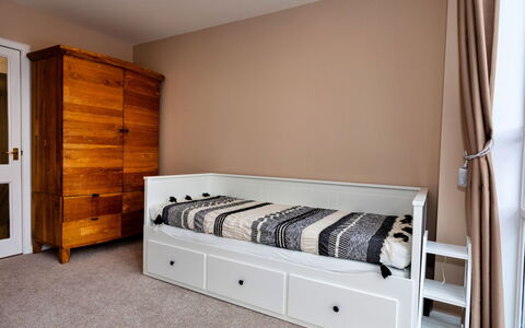 The Kiln: Furniture, Interior Design, Wall, Floor, Flooring, Bed, Wood, Room, Bedroom, Textile