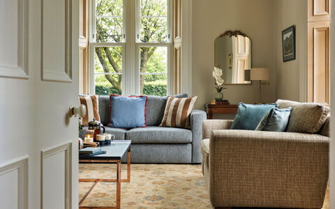 Spinney Corner: Couch, Furniture, Interior Design, Flooring, Living Room, Floor, Throw Pillow, Room, Pillow