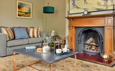 Spinney Corner: Furniture, Interior Design, Flooring, Wood, Living Room, Floor, Home, Hearth, Couch, Lighting