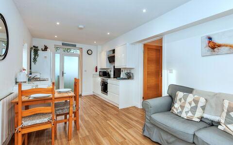 North View Annexe: Furniture, Flooring, Interior Design, Wood, Floor, Wood Flooring, Ceiling, Table, Apartment, Room