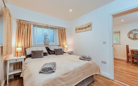 North View Annexe: Furniture, Bed, Interior Design, Bedroom, Bedding, Bed Sheet, Wood, Linens, Ceiling, Floor
