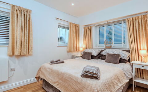 North View Annexe: Bed, Furniture, Bedroom, Interior Design, Bedding, Bed Sheet, Wood, Ceiling, Linens, Floor